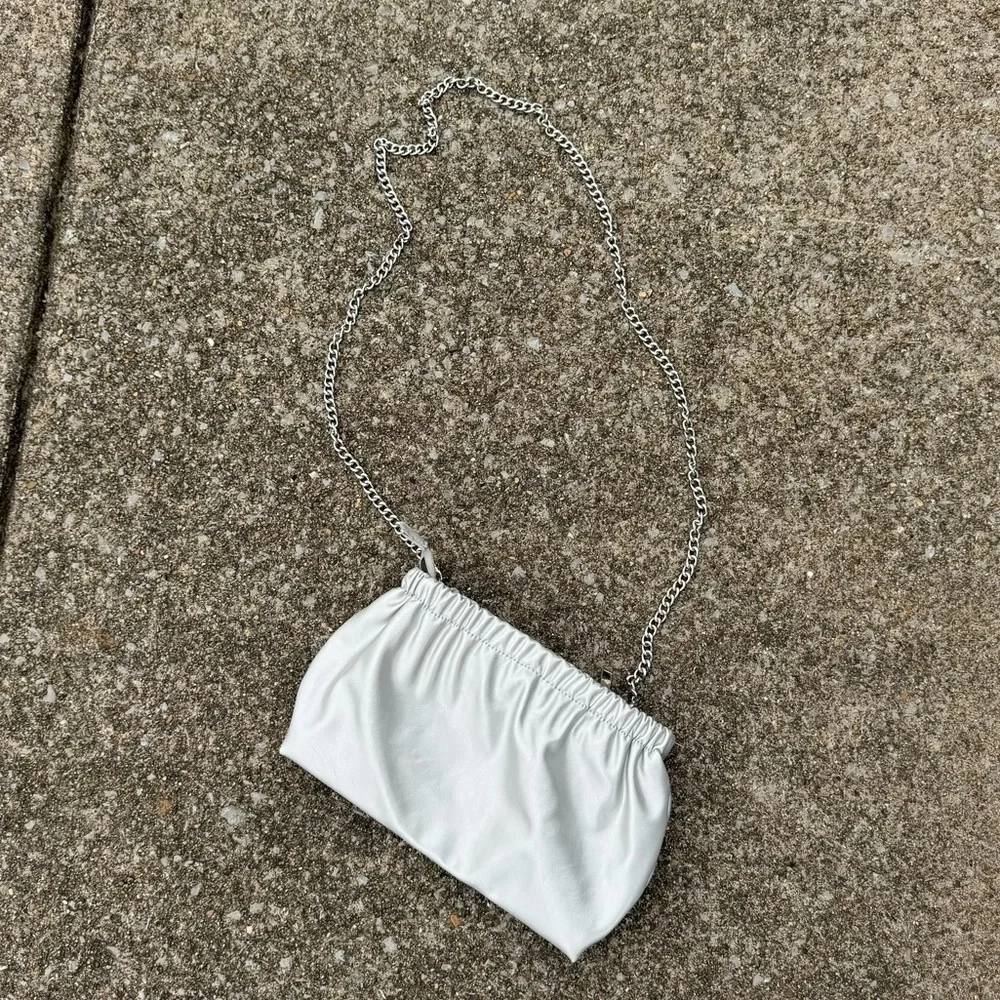 Silver ahdorned crossbody bag